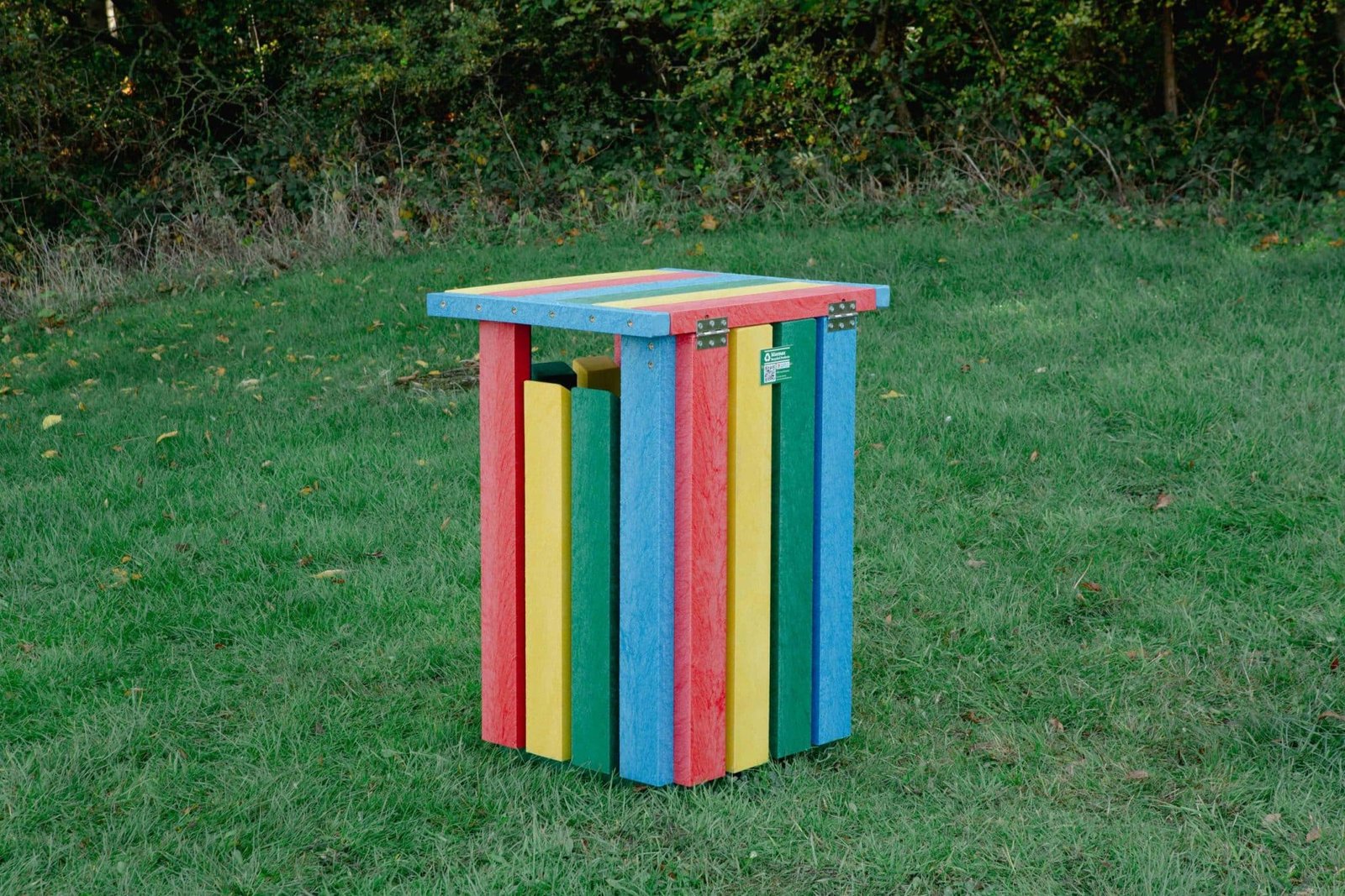Waste Bin Rainbow - Marmax Recycled Plastic Products - Manufactured in the UK Rainbow Waste Bin on grass